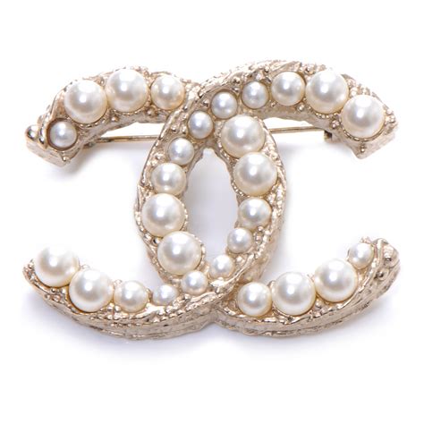 chanel pearl brooch.